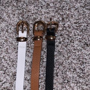 Three different colored accent belts